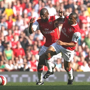 Abu Diaby and Julio Baptista (Arsenal) go for the same ball