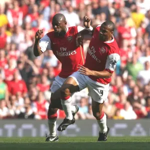 Abu Diaby and Julio Baptista (Arsenal) go for the same ball