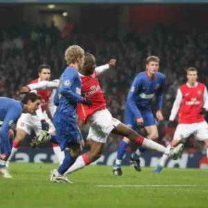 Abu Diaby shoots past Bucuresti keeper Robinson Zapata to score the 1st Arsenal goal