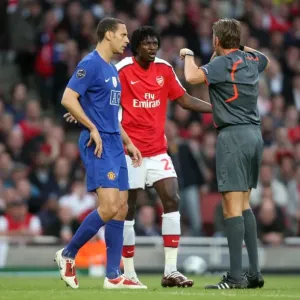 Adebayor and Ferdinand's Contentious Chat: Arsenal vs. Manchester United in the UEFA Champions League Semi-Final Adebayor and Ferdinand's Contentious Chat: Arsenal vs. Manchester United in the UEFA Champions League Semi-Final