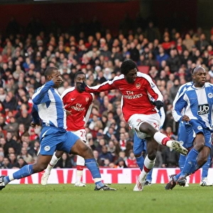 Adebayor Scores Stunner: Arsenal Lead Wigan 1-0