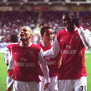 Adebayor and Walcott-Ljungberg: Celebrating Arsenal's Win at Wigan (December 2006)