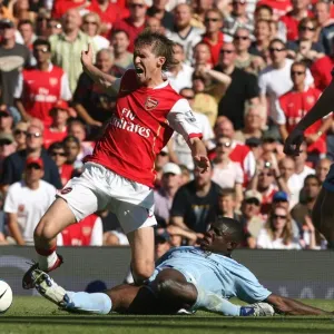 Alex Hleb (Arsenal) is fouled by Micah Richards (Man City) for the Arsenal penalty
