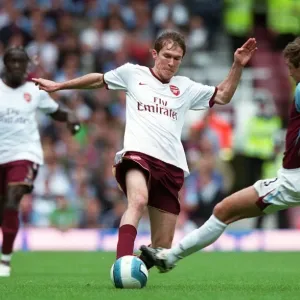 Alex Hleb (Arsenal) George McCartney (West Ham) Alex Hleb (Arsenal) George McCartney (West Ham)