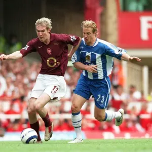 Alex Hleb (Arsenal) Reto Ziegler (Wigan). Arsenal 4: 2 Wigan Athletic