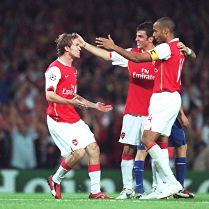 Alex Hleb celebrates scoring Arsenals 2nd goal with Thierry Henry and Cesc Fabregas