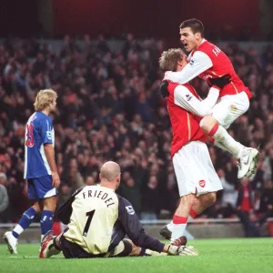 Alex Hleb celebrates scoring Arsenals 2nd goal with Cesc Fabregas and Brad Friedel