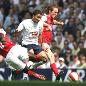 Alex Hleb and Kolo Toure (Arsenal) with Aaron Lennon (Tottenham) Print