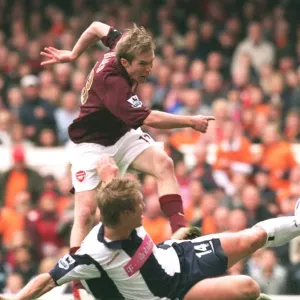 Alex Hleb scores Arsenals 1st goal under pressure from Martin Albrechsten Alex Hleb scores Arsenals 1st goal under pressure from Martin Albrechsten