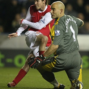 Alex Hleb shoots past Reading goalkeeper Marcus Hahnemann to score the 3rd Arsenal goal