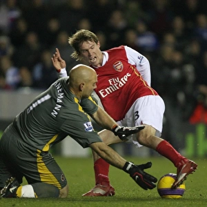 Alex Hleb turns past Reading goalkeeper Marcus Hahnemann to score the 3rd Arsenal goal