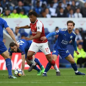 Alex Iwobi (Arsenal) Adrien Silva and Christian Fuchs (Leicester). Leciester City 3 Alex Iwobi (Arsenal) Adrien Silva and Christian Fuchs (Leicester). Leciester City 3