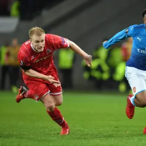 Alex Iwobi Breaks Past Frederik Sorensen: Arsenal's Thrilling Moment against 1. FC Koln in Europa League Alex Iwobi Breaks Past Frederik Sorensen: Arsenal's Thrilling Moment against 1. FC Koln in Europa League