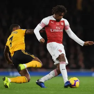 Alex Iwobi Outsmarts Ivan Cavaleiro: A Premier League Battle at Emirates Stadium