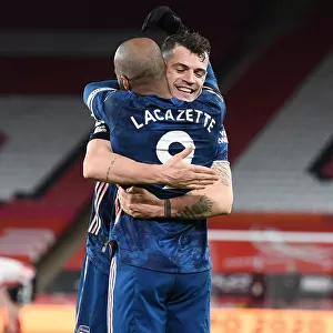 Alex Lacazette and Granit Xhaka Celebrate Arsenal's Third Goal Against Sheffield United (April 2021)
