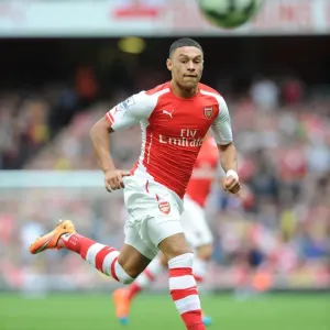 Alex Oxlade-Chamberlain: In Action for Arsenal Against Hull City, Premier League 2014-15 Alex Oxlade-Chamberlain: In Action for Arsenal Against Hull City, Premier League 2014-15