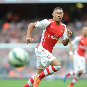 Alex Oxlade-Chamberlain in Action for Arsenal vs Hull City, Premier League 2014-15 Alex Oxlade-Chamberlain in Action for Arsenal vs Hull City, Premier League 2014-15