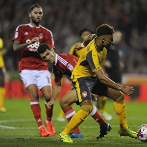 Alex Oxlade-Chamberlain (Arsenal) Eric Lichaj (Forest). Nottingham Forest 0: 4 Arsenal