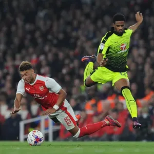 Alex Oxlade-Chamberlain (Arsenal) Garath McCleary (Reading). Arsenal 2: 0 Reading