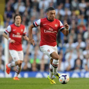 Alex Oxlade-Chamberlain: Arsenal Star in Action Against Tottenham Hotspur, Premier League 2013-14 Alex Oxlade-Chamberlain: Arsenal Star in Action Against Tottenham Hotspur, Premier League 2013-14