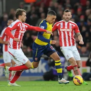 Alex Oxlade-Chamberlain vs Marc Muniesa: Intense Battle at Britannia Stadium Alex Oxlade-Chamberlain vs Marc Muniesa: Intense Battle at Britannia Stadium