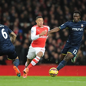 Alex Oxlade-Chamberlain's Slick Moves: Outsmarting Fonte and Wanyama in Arsenal's Victory over Southampton (2014-15)