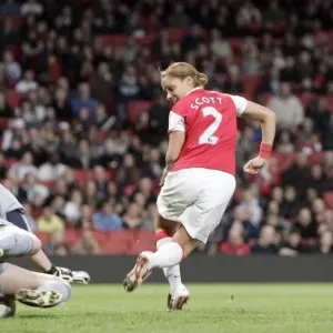 Alex Scott (Arsenal) trys to backheel the ball under Siobhan Chamberlian (Chelsea) Alex Scott (Arsenal) trys to backheel the ball under Siobhan Chamberlian (Chelsea)