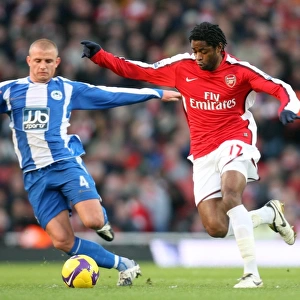Alex Song (Arsenal) Lee Catermole (Wigan)