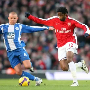 Alex Song (Arsenal) Lee Catermole (Wigan) Alex Song (Arsenal) Lee Catermole (Wigan)