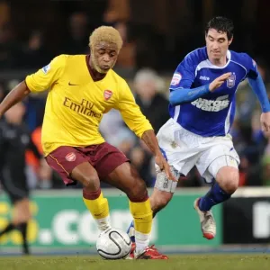 Alex Song (Arsenal) Mark Ekennedy (Ipswich). Ipswich Town 1: 0 Arsenal. Carling Cup Semi Final 1st Leg. Portman Road, Ipswich, 12 / 1 / 11. Credit : Arsenal Football Club /