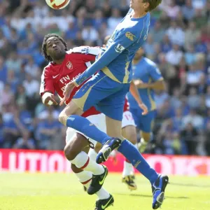 Alex Song (Arsenal) Peter Crouch (Portsmouth)