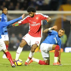 Alex Song (Arsenal) Richard Hughes and Kevin Prince Boateng (Portsmouth)