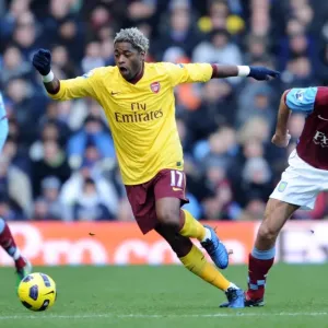 Alex Song (Arsenal) Robert Pires (Villa). Aston Villa 2: 4 Arsenal. Barclays Premier League Alex Song (Arsenal) Robert Pires (Villa). Aston Villa 2: 4 Arsenal. Barclays Premier League