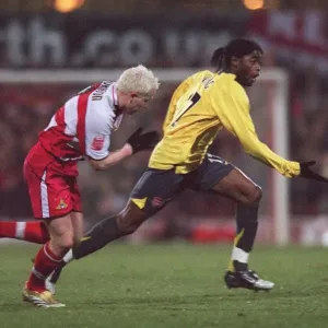 Alex Song (Arsenal) Sean Thornton (Doncaster), Doncaster Rovers 2 - 2 Arsenal Alex Song (Arsenal) Sean Thornton (Doncaster), Doncaster Rovers 2 - 2 Arsenal
