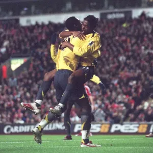 Alex Song celebrates scoring Arsenals 3rd goal with Johan Djourou