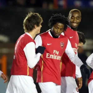 Alex Song celebrates scoring Arsenals goal with Johan Djourou and Havard Nordtveit