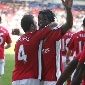 Alex Song and Cesc Fabregas: Celebrating Arsenal's 4th Goal in 1:4 Victory over Wigan Athletic Alex Song and Cesc Fabregas: Celebrating Arsenal's 4th Goal in 1:4 Victory over Wigan Athletic