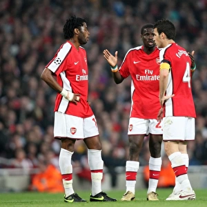 Alex Song, Emmanuel Eboue and Cesc Fabregas (Arsenal)