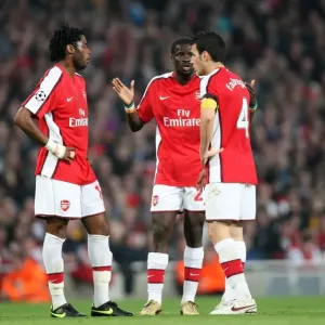 Alex Song, Emmanuel Eboue and Cesc Fabregas (Arsenal) Alex Song, Emmanuel Eboue and Cesc Fabregas (Arsenal)