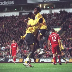 Alex Song and Johan Djourou: Celebrating Arsenal's Historic 3-6 Win Over Liverpool in the Carling Cup