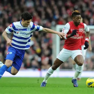 Alex Song Outmaneuvers Alejandro Faurlin in Arsenal's Victory over Queens Park Rangers