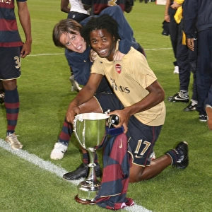 Alex Song and Tomas Rosicky celebrate the Arsenal victory