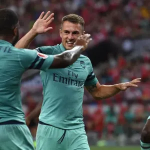 Alexandre Lacazette and Aaron Ramsey Celebrate Goal for Arsenal against Paris Saint-Germain in 2018 International Champions Cup, Singapore