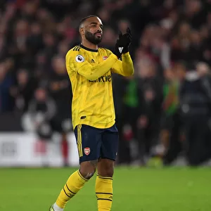 Alexandre Lacazette Celebrates with Arsenal Fans after Sheffield United Victory (2019-20)
