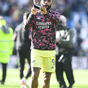 Alexandre Lacazette Celebrates with Fans: Leicester City vs. Arsenal, 2021-22 Premier League