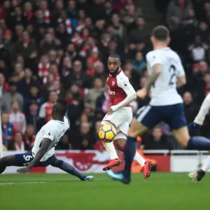 Alexandre Lacazette crosses the ball to Alexis Sanchez to score Arsenals 2nd goal