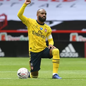 Alexandre Lacazette Kneels: A Show of Solidarity in FA Cup Quarterfinal - Sheffield United vs. Arsenal