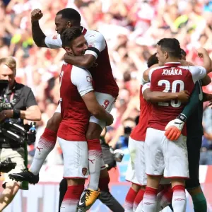 Alexandre Lacazette and Olivier Giroud (Arsenal) celebrate winning the penalty shoot out Alexandre Lacazette and Olivier Giroud (Arsenal) celebrate winning the penalty shoot out