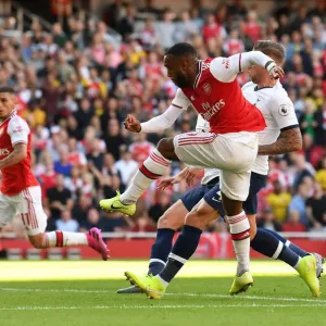 Alexandre Lacazette Scores the Opener: Arsenal Triumphs over Tottenham in Intense Premier League Clash (2019-20) Alexandre Lacazette Scores the Opener: Arsenal Triumphs over Tottenham in Intense Premier League Clash (2019-20)