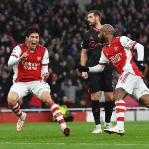 Alexandre Lacazette and Takehiro Tomiyasu Celebrate Arsenal's First Goal vs Southampton (Premier League 2021-22)